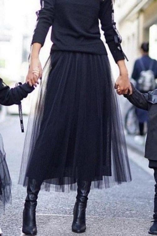 Black tulle over skirt with high boots