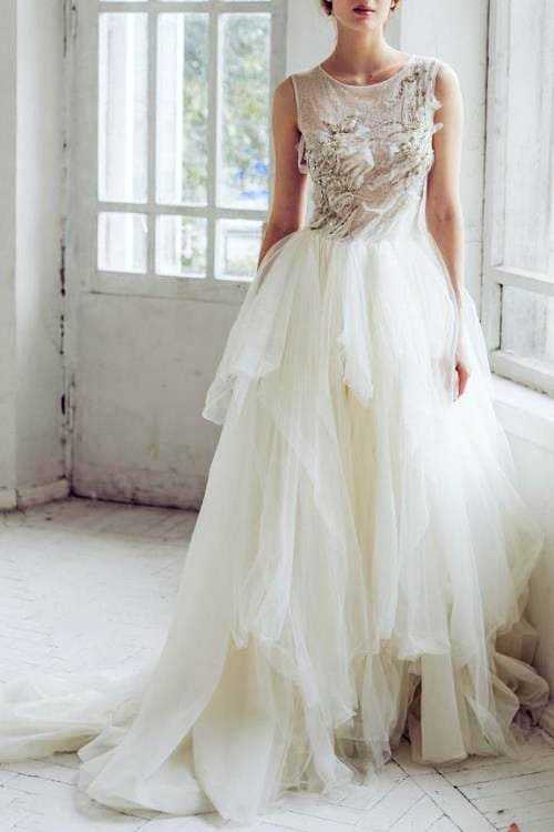 Beautiful Lace wedding dress with ivory silk skirt and buttons on the back