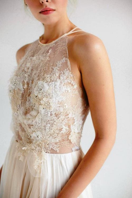 Lovely Boho wedding dress. Totally unique romantic lace and silk wedding gown with halter neckline and open back.