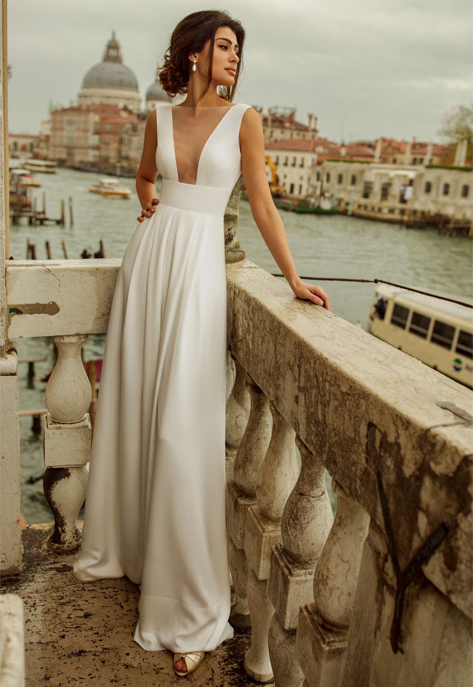 Gorgeous Wedding Jumpsuit with deep neckline cut and transparent fabric