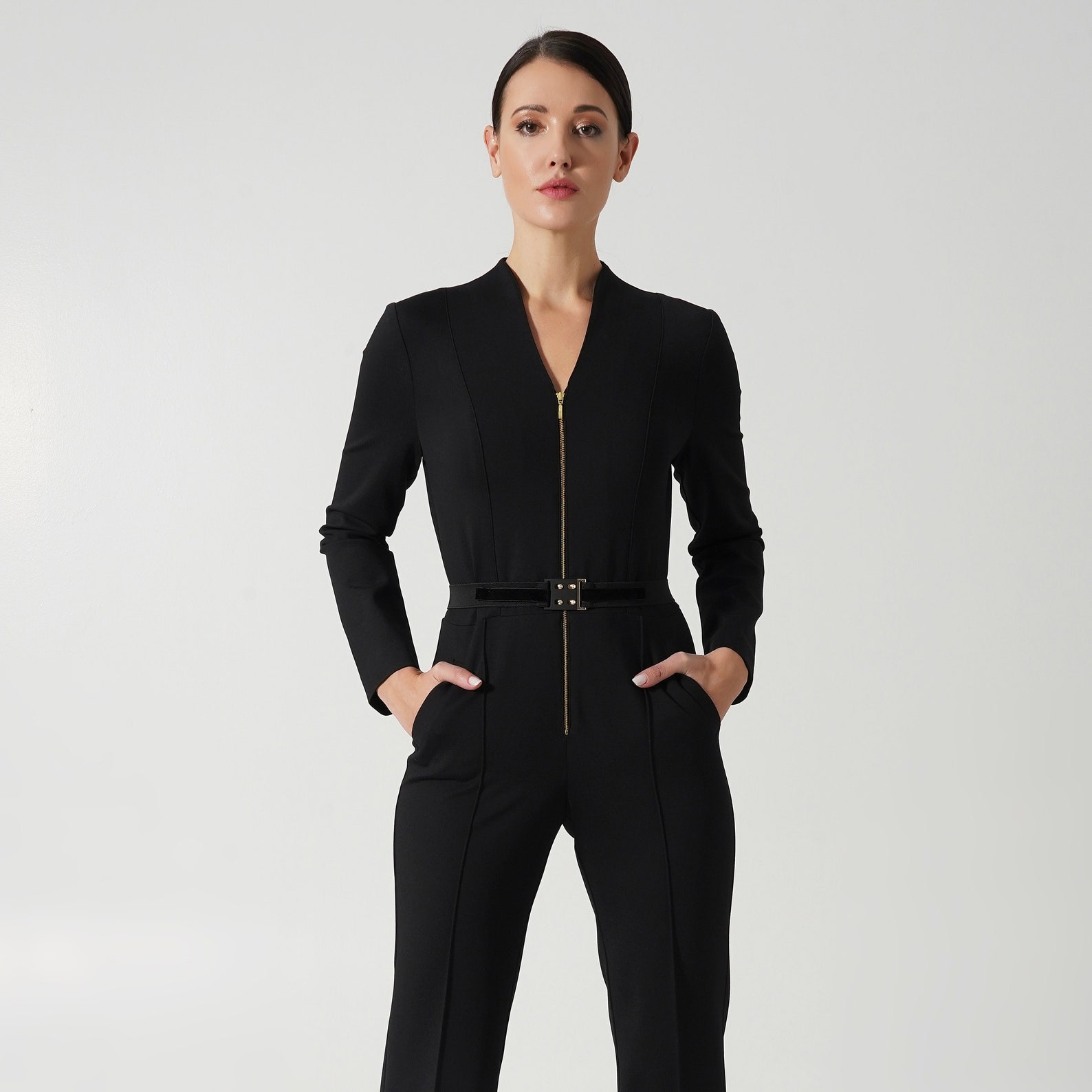 Black Jumpsuit with front metal zipper and pockets. so chic for a party!...